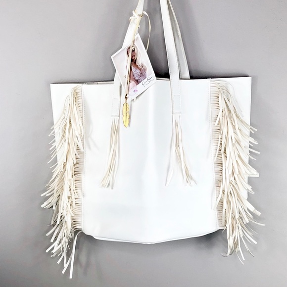 Jessica Simpson Handbags - Jessica Simpson White Vegan Leather Tassel Tote